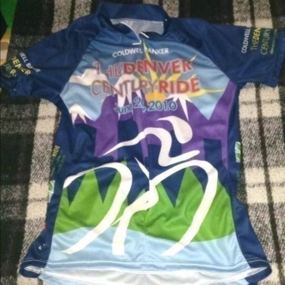 Primal cycling women’s biking blue shirt size M with pockets